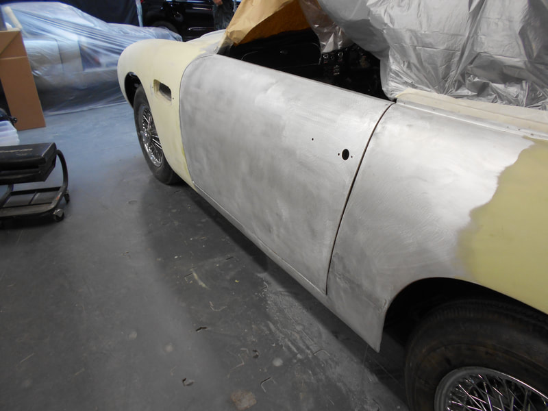 Aston Martin DB6 Volante Restoration -left hand door skin fitted