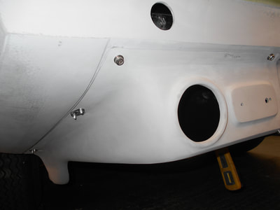 Aston Martin DBS Restoration -
dry fitting of rear splitters