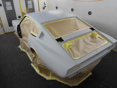 Aston Martin DBS paintwork -
Masking complete ready for epoxy wet on wet primer/sealer
