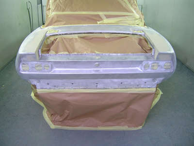 Aston Martin V8 Restoration -
rear levelled and masked ready for spray polyester