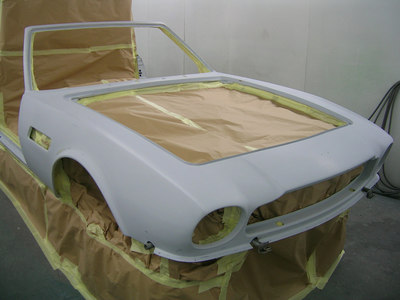 Aston Martin V8 paintwork -
front masked ready for topcoat