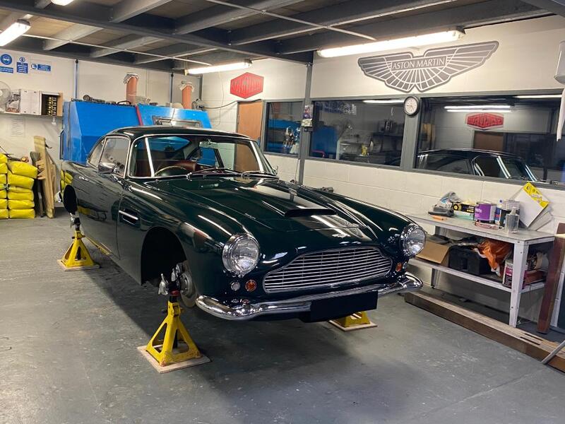 Aston Martin DB4 restoration - wheels removed ready for parts removal