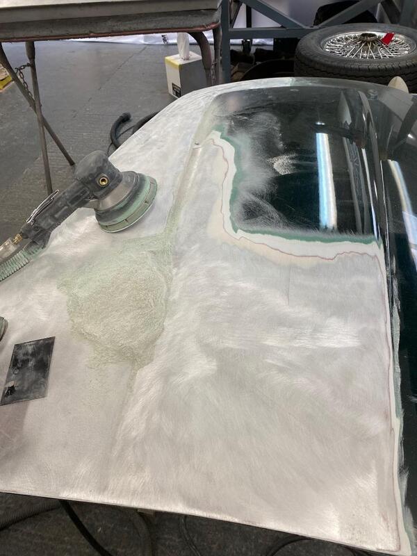 Aston Martin DB4 restoration - removing the paint and material from the bonnet