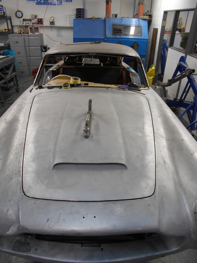 Aston Martin DB5 Restoration -
All existing paint and filler removed and all panels re gapped to a consistent 5mm 