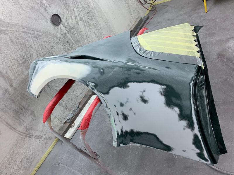 Aston Martin DBRS9 paintwork -
right rear wing repairs complete