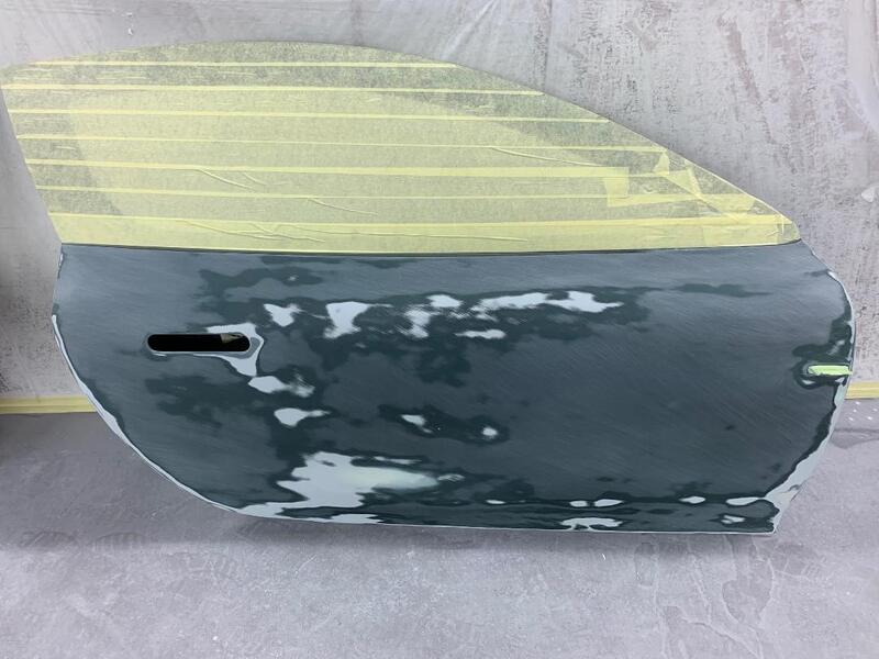 Aston Martin DBRS9 paintwork -
right hand door blocked to improve the shape