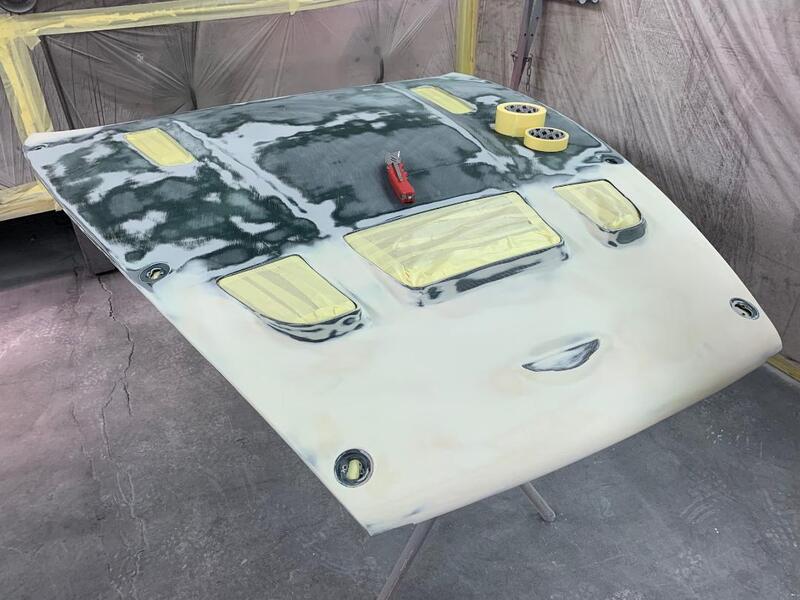 Aston Martin DBRS9 paintwork -
bonnet repairs complete