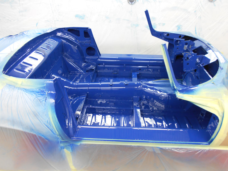 Jaguar E-type paintwork - cabin area all coloured up in Azure Blue