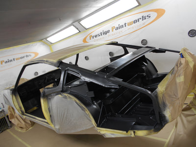 Aston Martin DBS Restoration -
Internal panels being Epoxy protected