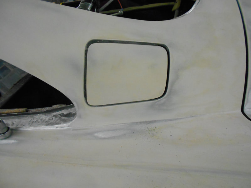 Aston Martin DB5 Restoration - left hand fuel flap nearly fitting