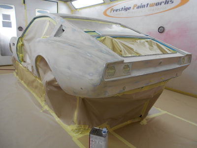 Aston Martin DBS Restoration -
levelling complete, masked ready for spray polyester