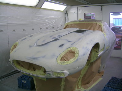 Jaguar E-Type restoration -
Levelling complete, masked for polyester