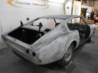 Aston Martin DBS Restoration -
2nd poly on now for more sanding