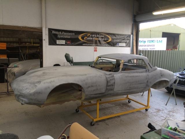 Jaguar E-Type restoration -
bodyshell and factory hardtop all levelled and in spray polyester