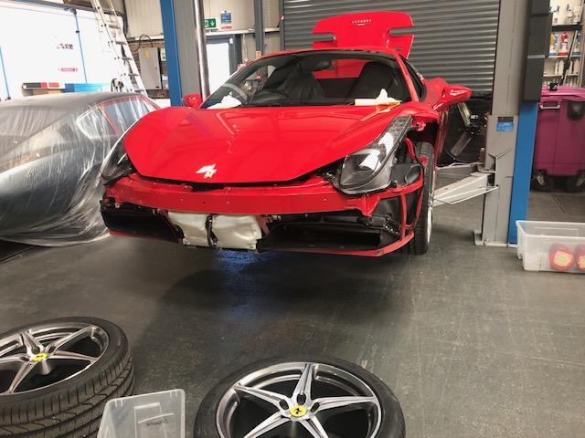 Ferrari 458 paintwork -
removing parts for paintwork