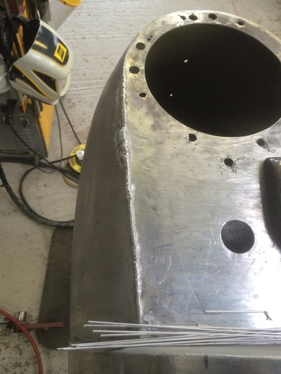 Aston Martin Restoration -
tig welding up splits to right hand side of the bonnet