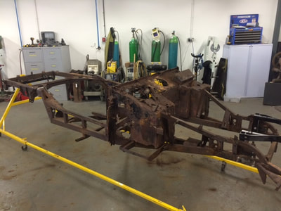 Aston Martin Restoration -Completely stripped out and ready to go for chemical dipping to remove all signs of rust