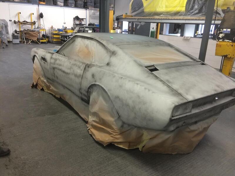 Aston Martin DBS Restoration -
in spray polyester primer - 1
