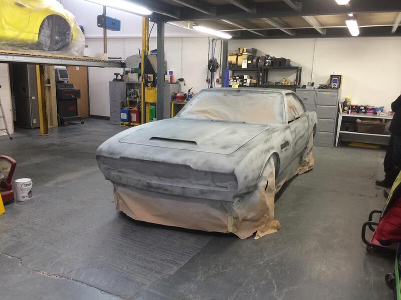Aston Martin DBS Restoration -
in spray polyester primer - 2