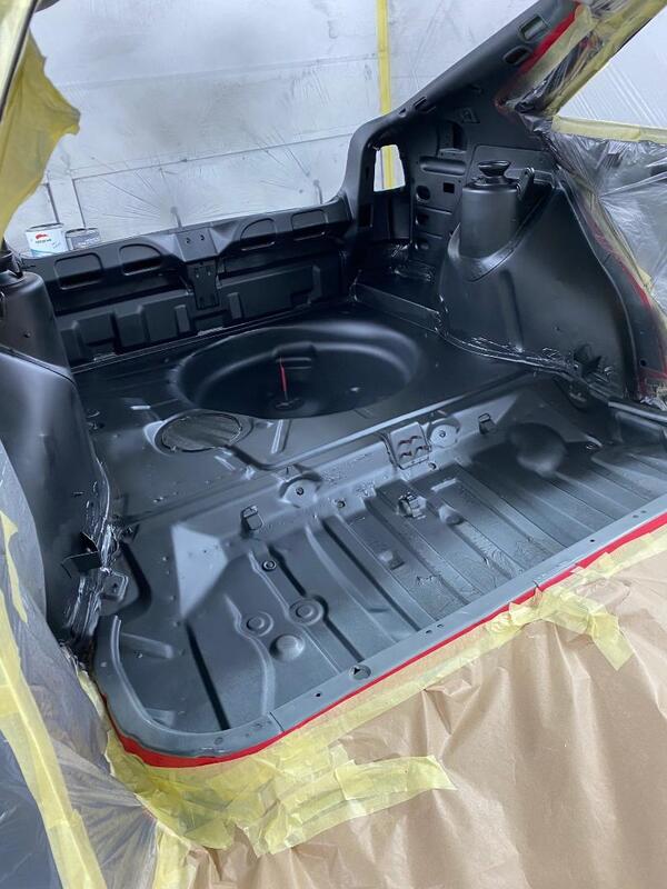 trunk with wet on wet primer applied
